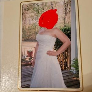 Wedding Bells?? Beautiful wedding gown that has been Heirloomed.